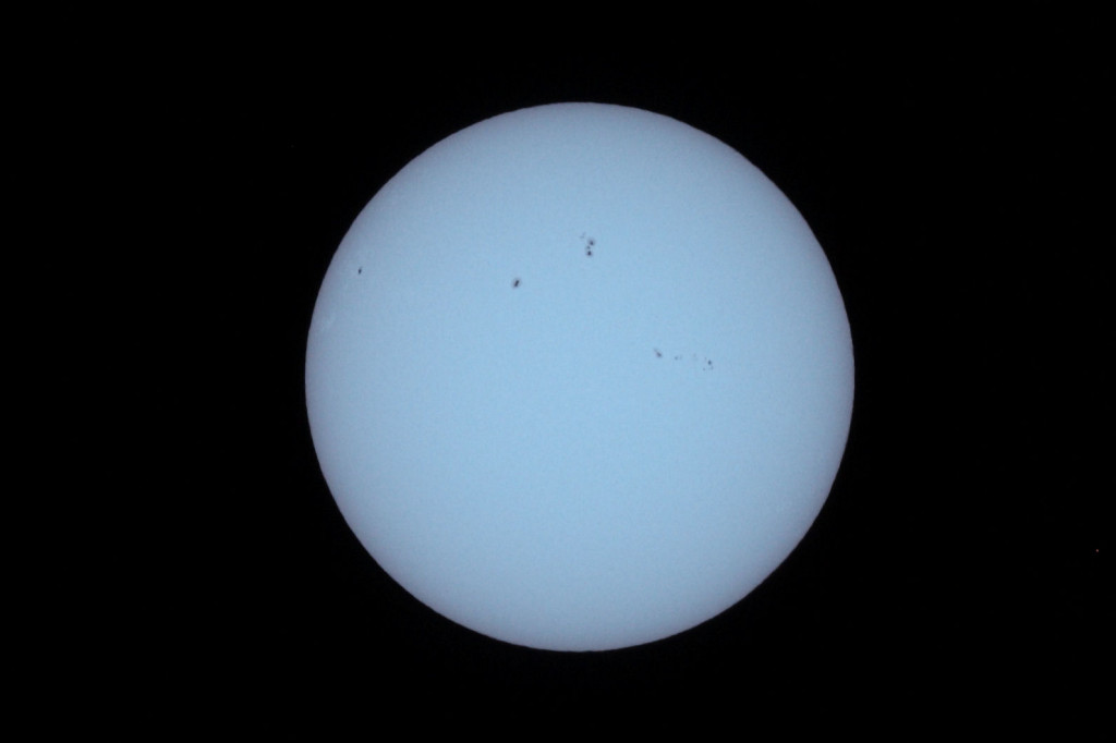 Sunspot groups taken with a William Optics GT81 and Baader Solar Film. The exposure was 1/2500s at ISO 200.